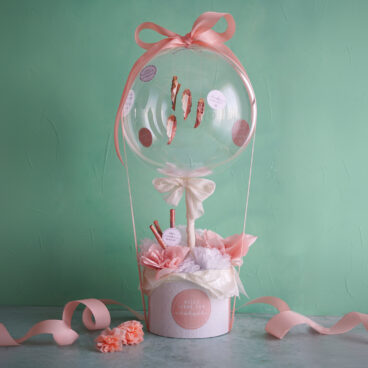 Geldgeschenk Hochzeit: DIY Luftballon mit Geld-Palmblättern