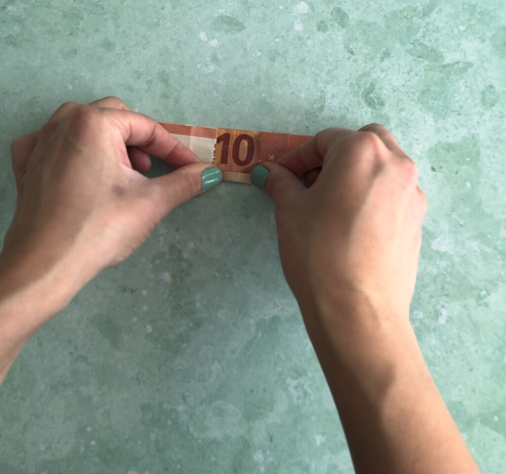 Geld falten Palmblätter