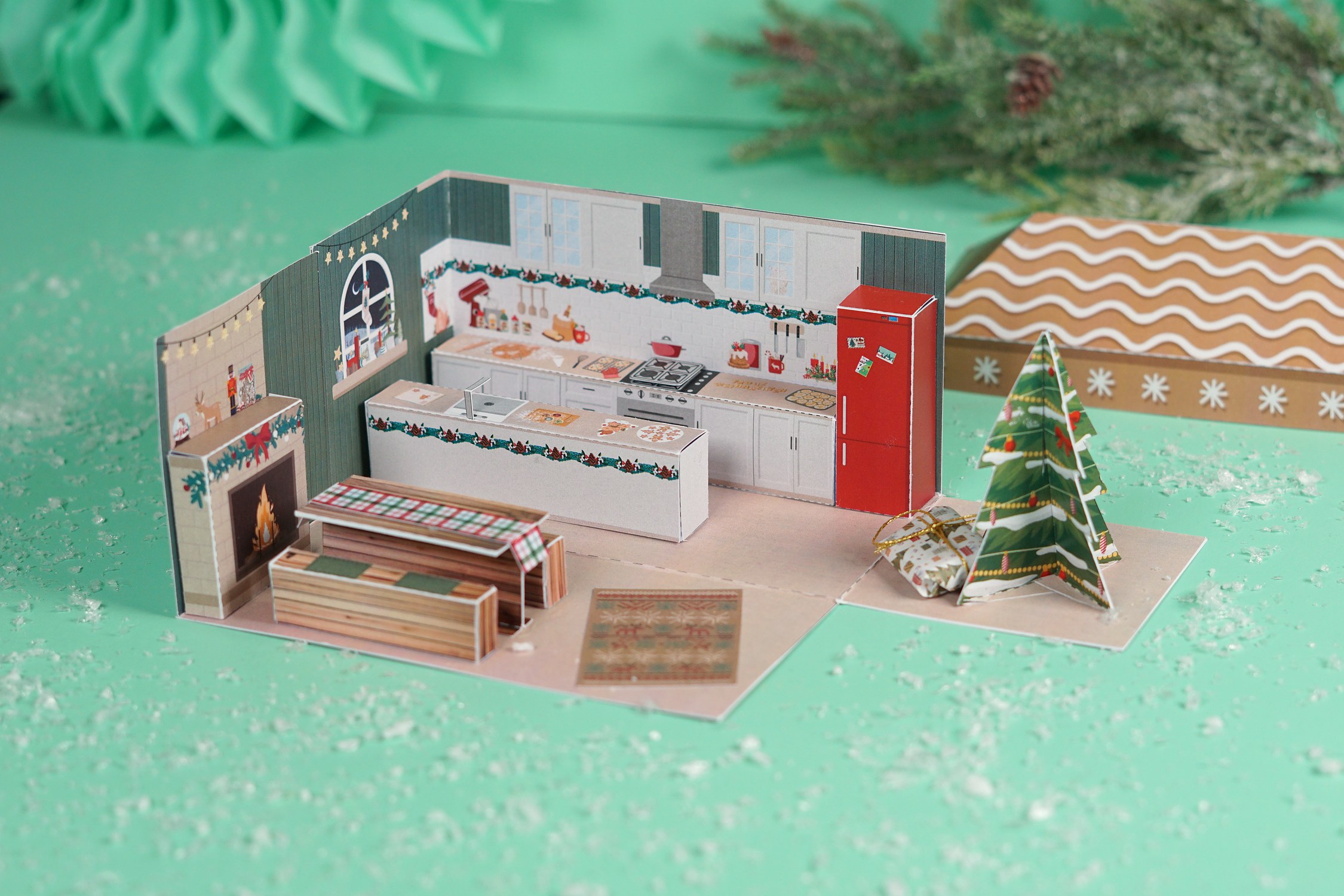 Aufgeklappte DIY Explosionsbox als Geldgeschenk zu Weihnachten mit Weihnachtsbäckerei, Kamin, Küche und Tannenbaum aus Papier